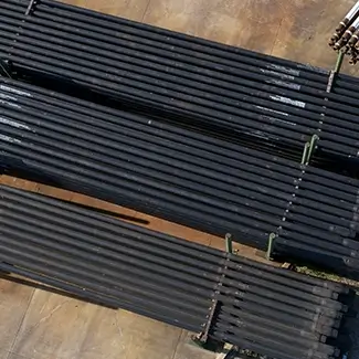 XT-M™ drill pipes lined up outside