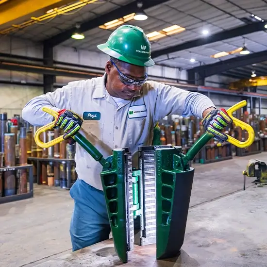 A Workstrings worker opening Rotary Slips