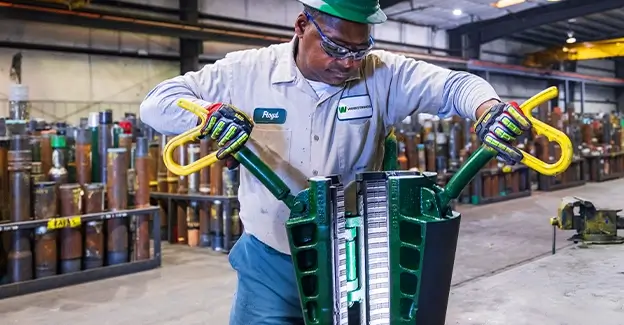 A Workstrings worker opening Rotary Slips